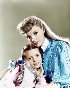 Turn Of The Century Prints: MEET ME IN ST. LOUIS, from left: Margaret O'Brien, Judy Garland, 1944