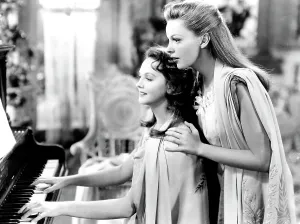 Playing Piano Prints: MEET ME IN ST. LOUIS, Lucille Bremer, Judy Garland, 1944