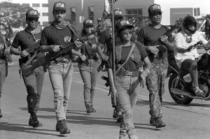 Protests Prints: Members of one of General Manuel Noriega's loosely organized Dignity Battalions march through the streets of Panama