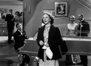 Playing Piano Prints: ONE HUNDRED MEN AND A GIRL, Leonid Kinskey, (at piano), Deanna Durbin, 1937