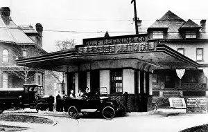 Vintage Car Prints: Three men in a highly polished Chalmers touring car wait for service at Supreme Oil Co