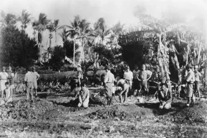 Executions Prints: Three men kneel before their open graves on Guam in 1941