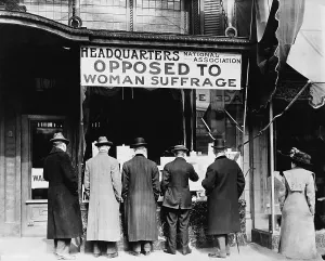 Social Movements Prints: Men looking in the window of the National Anti-Suffrage Association headquarters