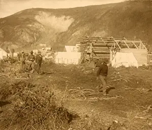 Mining Prints: Men walking on Dawson City's Riverside Drive