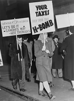 Protesters Prints: Men and women picketing against the use of tax dollars for the development of nuclear weapons