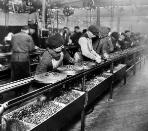 Ford Prints: Men work on the flywheel magneto