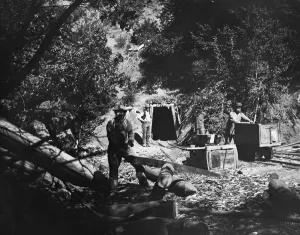 Extraction Prints: Four men working in Californias Sierra Nevada gold mining district
