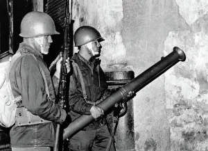 Bazooka Prints: Mexico City: Mexican Army troops prepare to fire bazooka shell through a door of a student 'fortress
