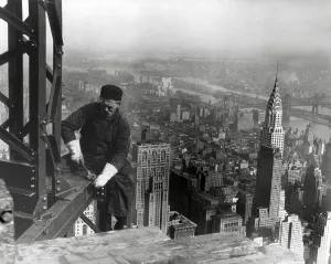 Construction Site Prints: Middle aged iron worker at the Empire State Building construction site