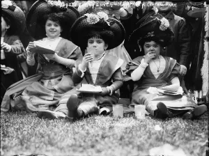 Matching Clothes Prints: Midgets eating lunch in Central Park, New York City, photograph circa early 1900s