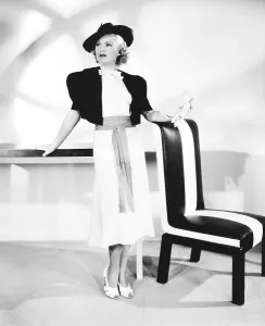 Images Dated 24th October 2013: ONE MILE FROM HEAVEN, Claire Trevor in Spanish influenced semi-sports ensemble designed by Herschel