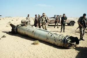 Missiles Prints: Military personnel examine a Scud missile shot down by an Patriot air defense missile during Operation Desert Storm