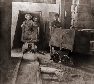 Silver Prints: Miners pushing ore carts through the tunnels of the Gould & Curry Mine in Virginia City
