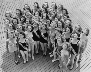 Bathing Suits Prints: Miss America contestants huddle together on the Boardwalk in Atlantic City