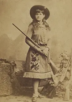 Annie Prints: Miss Annie Oakley in 1885, the year she and husband Frank Butler joined BUFFALO BILLS WILD WEST