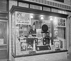 Consumer Product Prints: Miss Frances Talley in the shop window promotion of the A&P product