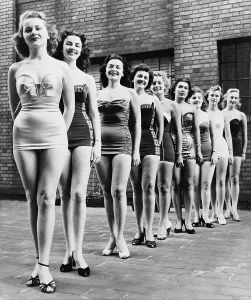 Pageants Prints: Miss New York City beauty contestants line up atop a city hotel in 1952