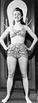 Sun Hat Prints: Model in a 1946 striped glazed cotton chintz bathing suit