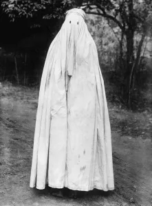 Traditional Prints: Mohammedan woman with head to toe burka in India 1922
