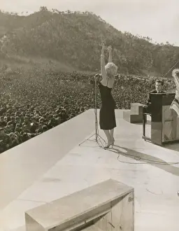 Movie Stars Prints: Monroe in Korea performing. She performed ten shows in four days during her USO tour in Korea