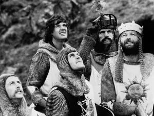 MONTY PYTHON AND THE HOLY GRAIL, from left: Eric Idle, Michael Palin (top), John Cleese, Terry Jones, Graham Chapman as King Arthur