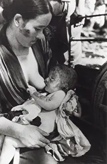 A Bomb Prints: Mother nursing her baby after surviving of the Nagasaki atomic bomb