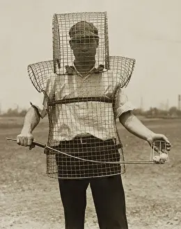 Protection Prints: Mouse-trap armor is the newest safety device seen on California golf courses in 1920s