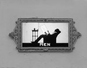 Bathroom Prints: Movie Theaters, restroom door, detail depicting a man reading