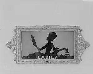 Bathroom Prints: Movie Theaters, restroom door, detail depicting a woman with a mirror