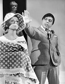 Designers Prints: Mr. John, the famous milliner with one of his creations