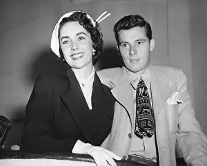 Heirs Prints: Mr. and Mrs. Conrad Hilton sailing on the Queen Mary for an extended European Honeymoon