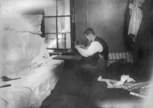 Apartment Prints: Mr. Rothenberg stitching neckties in small inner bedroom