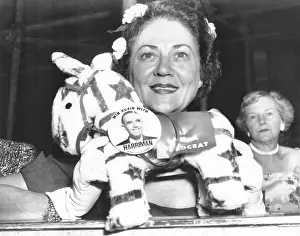 Political Conventions Prints: Mrs. Averill Harriman poses with a toy Donkey wearing a Harriman for President button