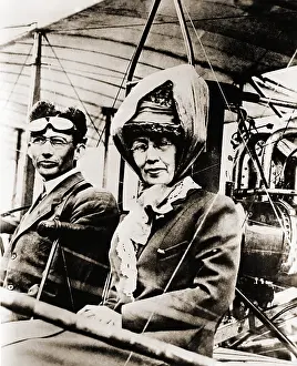 Mothers Prints: Mrs. Minta Martin with her son, Glenn L. Martin, in an early Martin plane