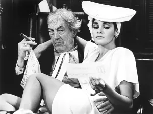Sitting On Lap Prints: MYRA BRECKINRIDGE, from left, John Huston