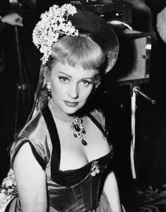 Images Dated 19th November 2008: NANA, Martine Carol, on the set between takes, 1955