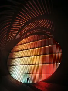 June Prints: A NASA technician is dwarfed by the doors of the Transonic Wind Tunnel at NASA Langley Research Center