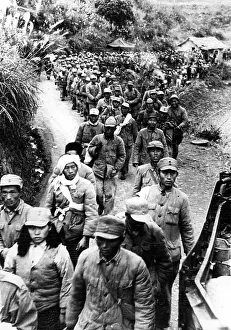 Nationalists surrender and are taken to interment camp, Saigon, Indo-China, 12-30-1949.. Courtesy: CSU Archives / Everett Collection
