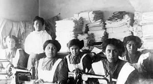 Student Prints: Native American girls in sewing class Bismark Indian School, North Dakota. 1909 -1920