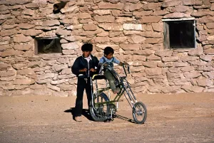 Bicycle Prints: Native American reservation. Two Hopi boys with a bicycle