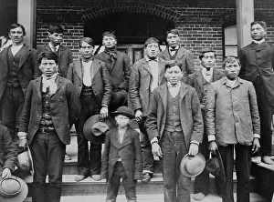 Trousers Prints: Native American young men and a boy posed on the steps of Carlisle Indian School, c. 1890