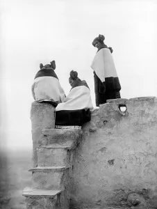 Over The Shoulder Prints: Native Americans, three Hopi women at the top of adobe steps