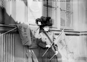 Suffrage Prints: Nellie van Slingerland, holding banner of Joan of Arc Suffrage League, circa 1900