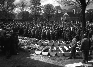 Russians Prints: In Neunburg, Germany, victims of SS troopers killing are buried. Chaplains of the U.S