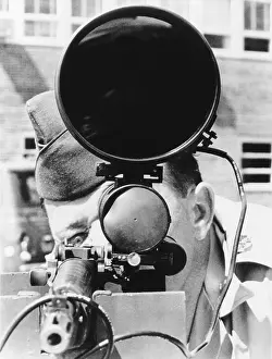 Repression Prints: New Jersey National Guardsman demonstrates the use of an M1 rifle with an infrared scope site