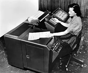 Operators Prints: New, lower cost, Burroughs electronic brain