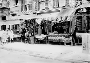 1900s Candids Prints: New York City, Italian wares on display in front of shops in Little Italy