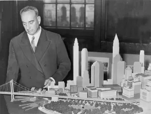 Moses Prints: New York City Park Commissioner Robert Moses (1888-1981) with model of proposed Battery Bridge in 1939