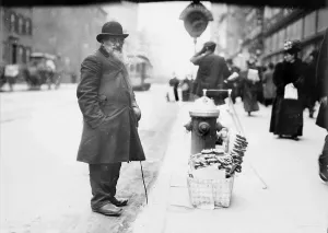 1900s Candids Prints: New York City, Pretzel vendor, 6th Avenue, New York, photograph circa 1900s-1920s
