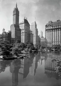 Central Park Prints: New York City, view of plaza buildings over park lake